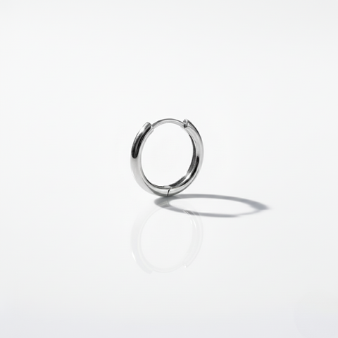 White gold minimal and rounded hoop on a white background