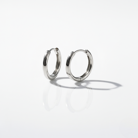 White gold minimal and rounded hoop on a white background