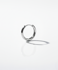 White gold minimal and rounded hoop on a white background